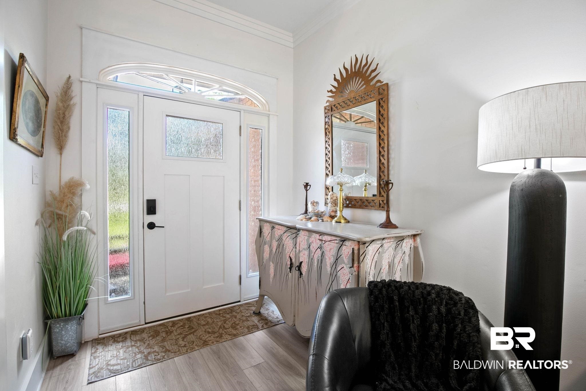 520 Juniper Place Drive Foley, AL 36535 - Photo 5 of 35 Entryway featuring a white door with frosted glass panels and an arched transom