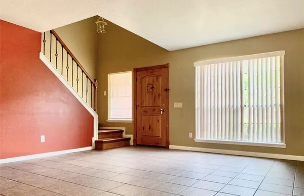 a view of an entryway with staircase