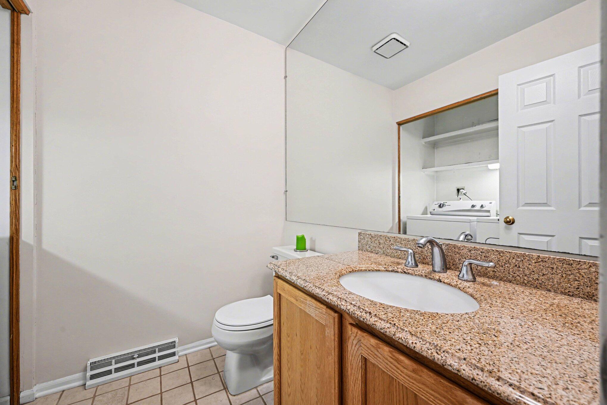 4356 Pine Ridge Court Ann Arbor, MI 48105 - Photo 9 of 22 main level half bath