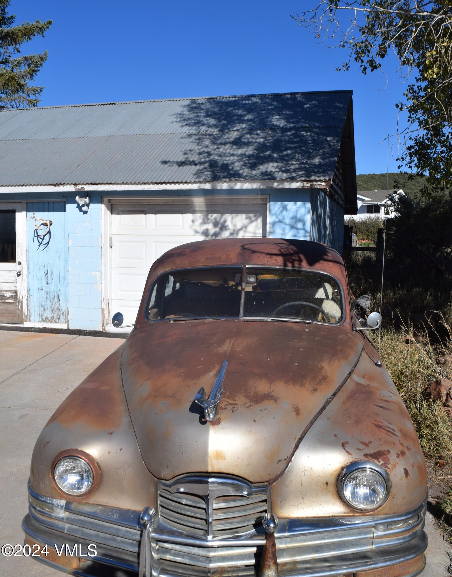 3536 Gypsum Creek Road Gypsum, CO 81637 - Photo 5 of 11 a car parked in the parking