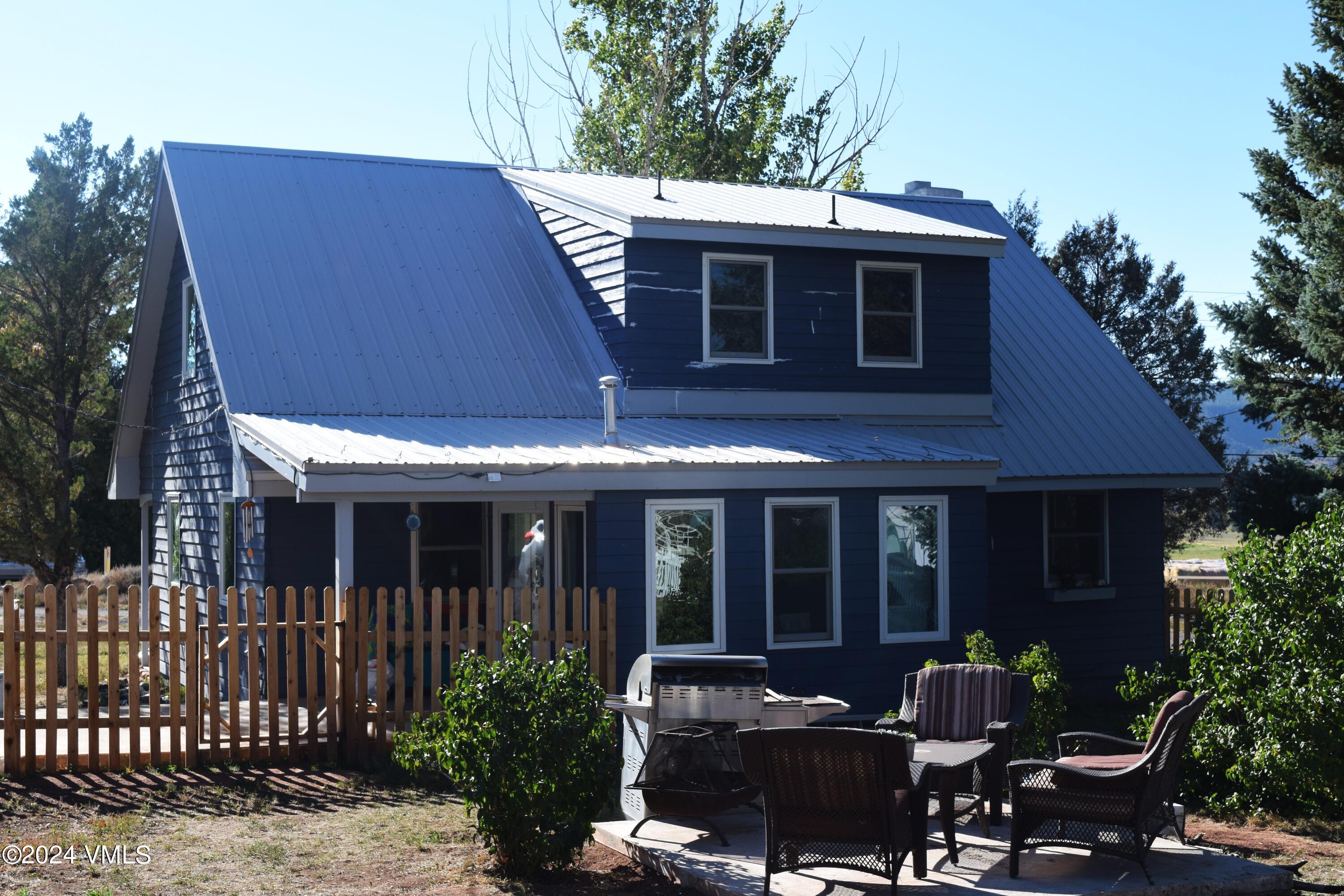 3536 Gypsum Creek Road Gypsum, CO 81637 - Photo 6 of 11 a front view of a house with sitting area