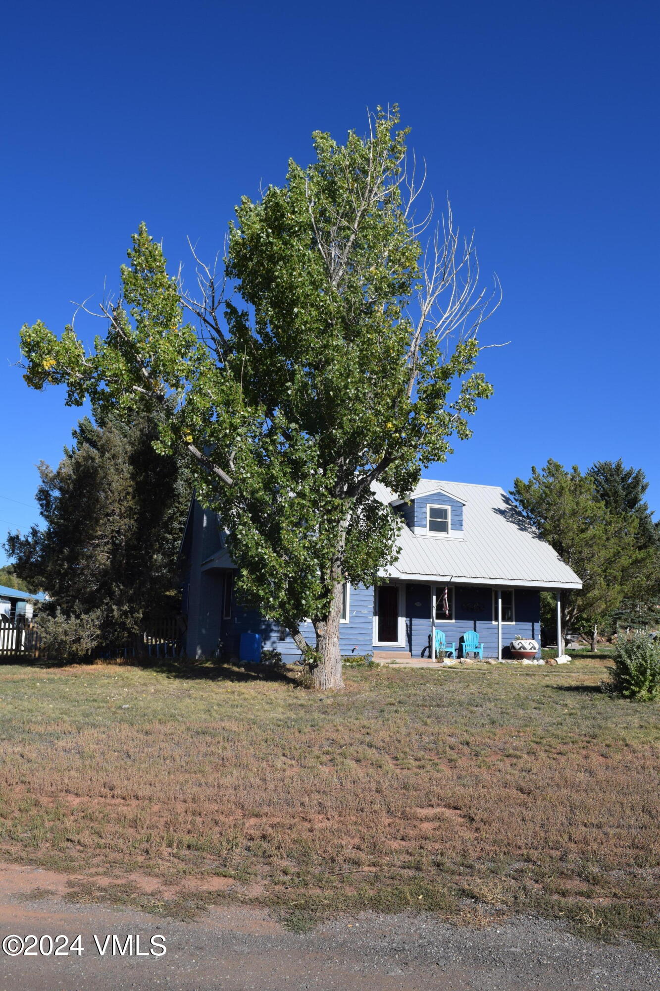 3536 Gypsum Creek Road Gypsum, CO 81637 - Photo 7 of 11 a front view of a house with a yard