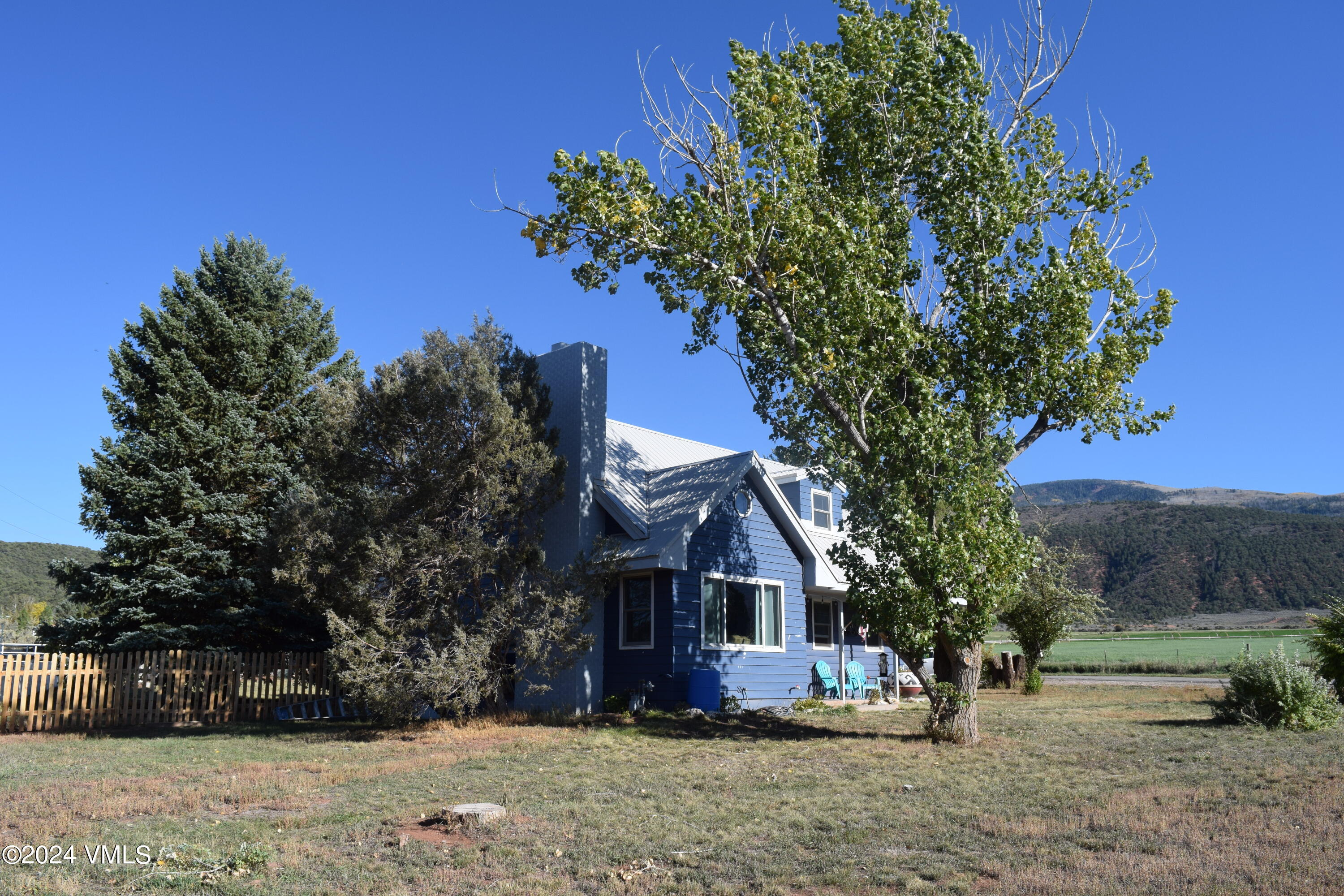 3536 Gypsum Creek Road Gypsum, CO 81637 - Photo 10 of 11 front view of a house with a tree