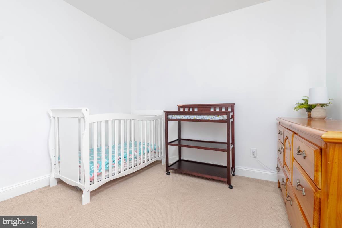 414 Enfield Road Joppa, MD 21085 - Photo 21 of 42 a view of a room with baby crib