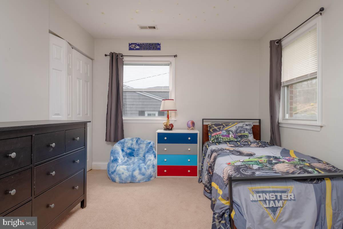 414 Enfield Road Joppa, MD 21085 - Photo 24 of 42 a bedroom with bed and a window
