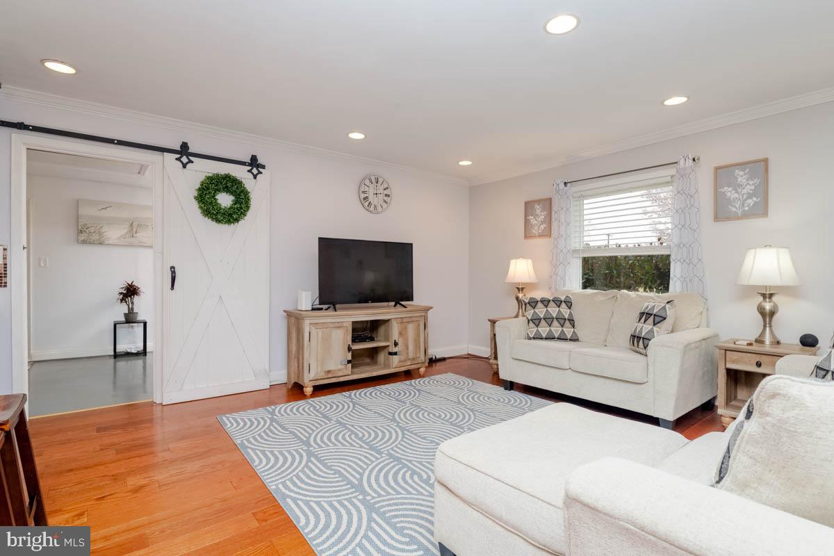 414 Enfield Road Joppa, MD 21085 - Photo 3 of 42 a living room with furniture and a flat screen tv