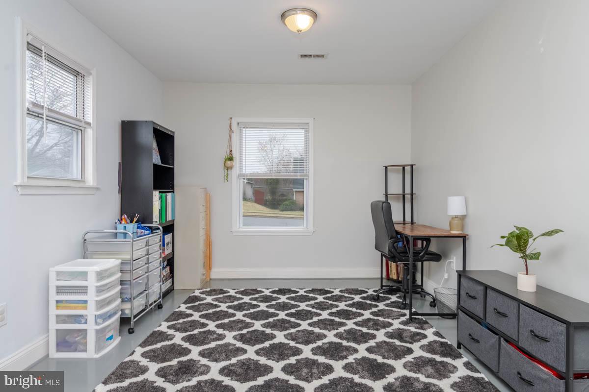 414 Enfield Road Joppa, MD 21085 - Photo 32 of 42 a living room with furniture and a window