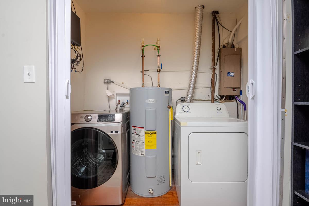 414 Enfield Road Joppa, MD 21085 - Photo 36 of 42 a utility room with dryer and washer