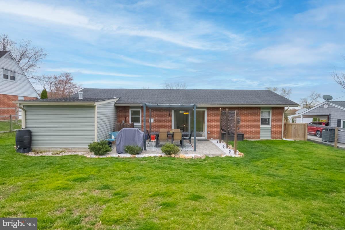 414 Enfield Road Joppa, MD 21085 - Photo 39 of 42 a front view of house with yard and seating area