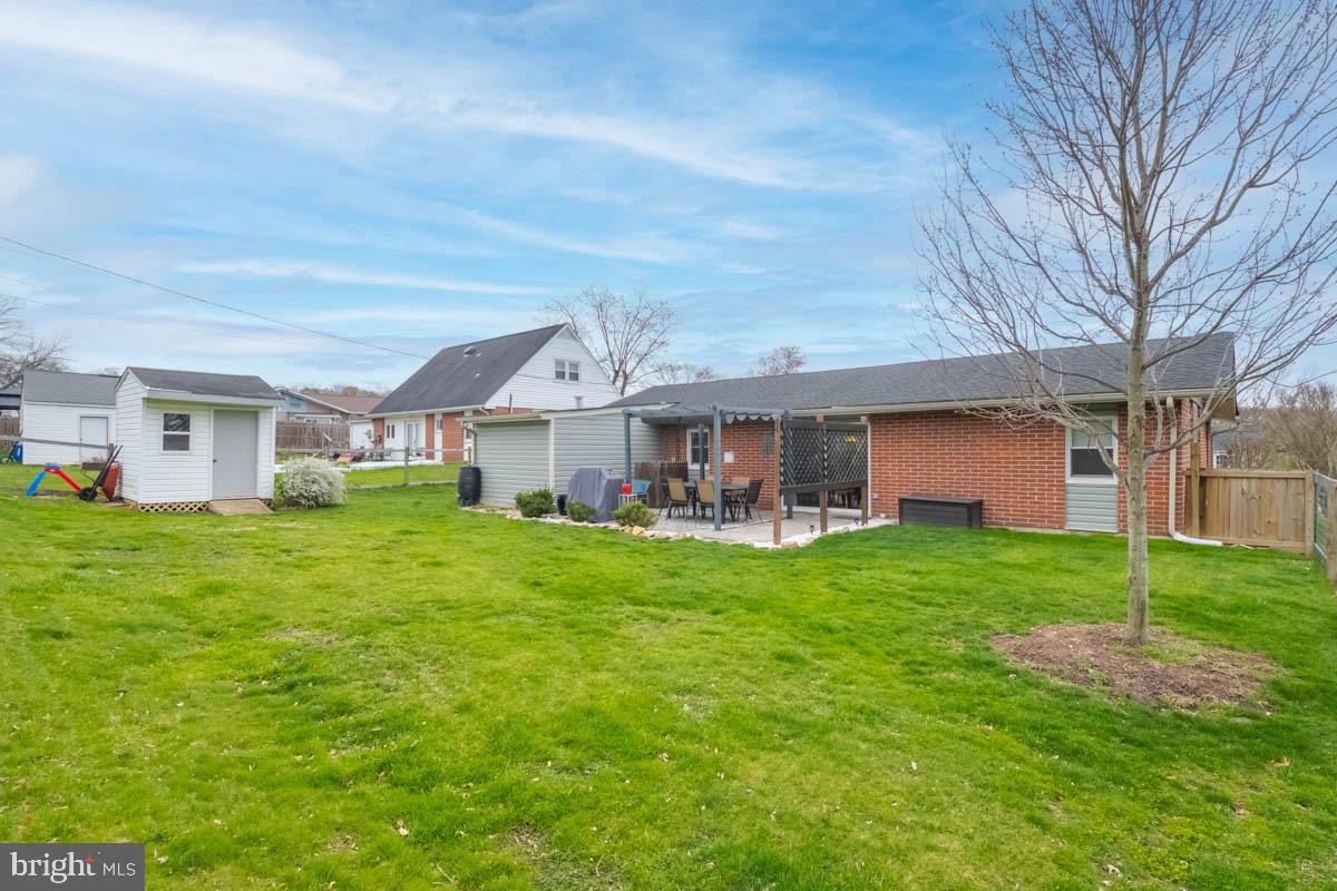 414 Enfield Road Joppa, MD 21085 - Photo 40 of 42 front view of a house with a yard