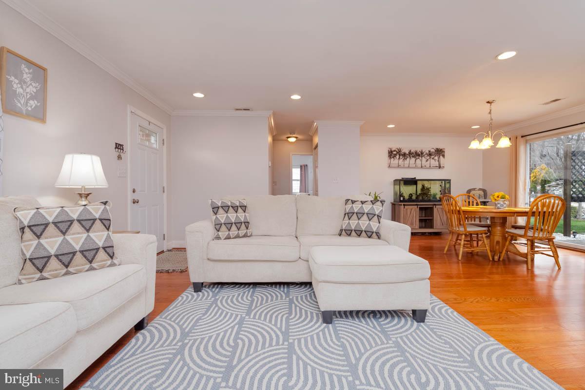 414 Enfield Road Joppa, MD 21085 - Photo 4 of 42 a living room with furniture and a table