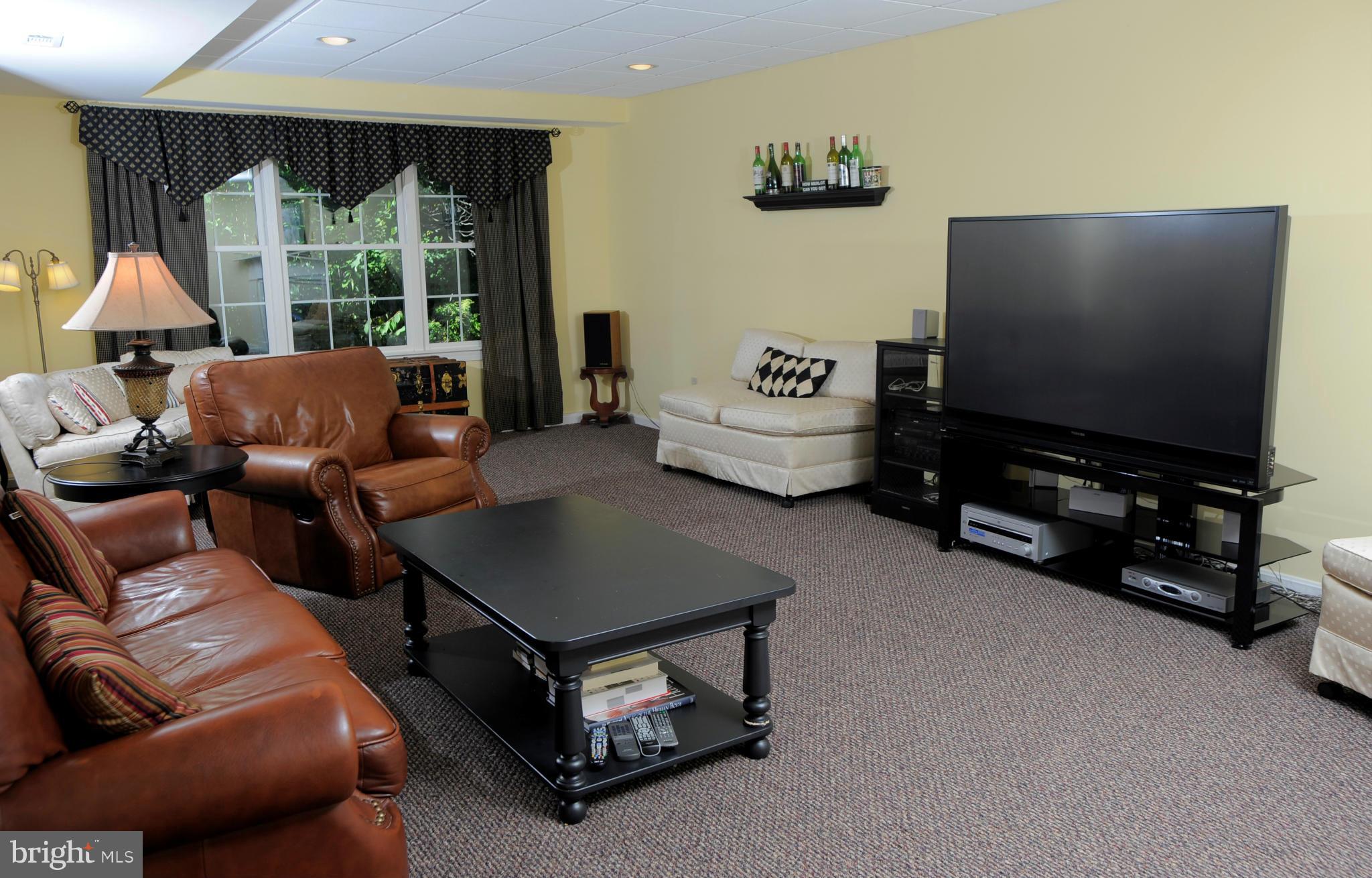 1676 Campbell Road Forest Hill, MD 21050 - Photo 23 of 30 LOWER LEVEL FAMILY ROOM WITH GAS FIREPLACE