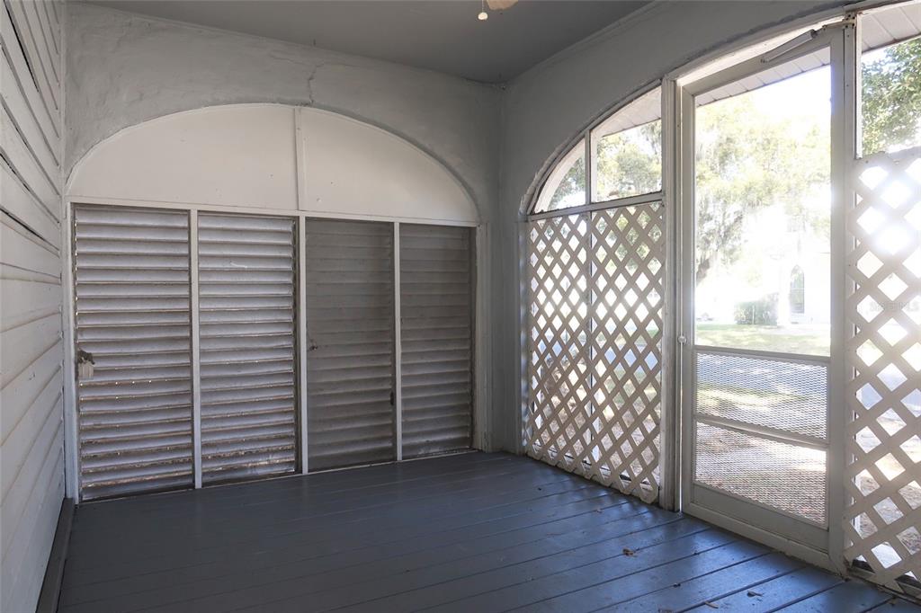 5353 10th Street Zephyrhills, FL 33542 - Photo 11 of 26 a view of an empty room with a balcony
