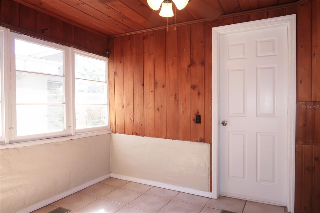 5353 10th Street Zephyrhills, FL 33542 - Photo 19 of 26 an empty room with windows