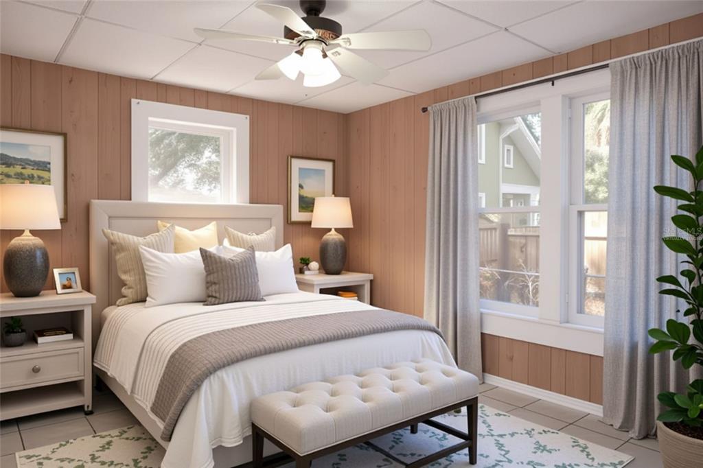 5353 10th Street Zephyrhills, FL 33542 - Photo 6 of 26 a bed room with a bed and a window