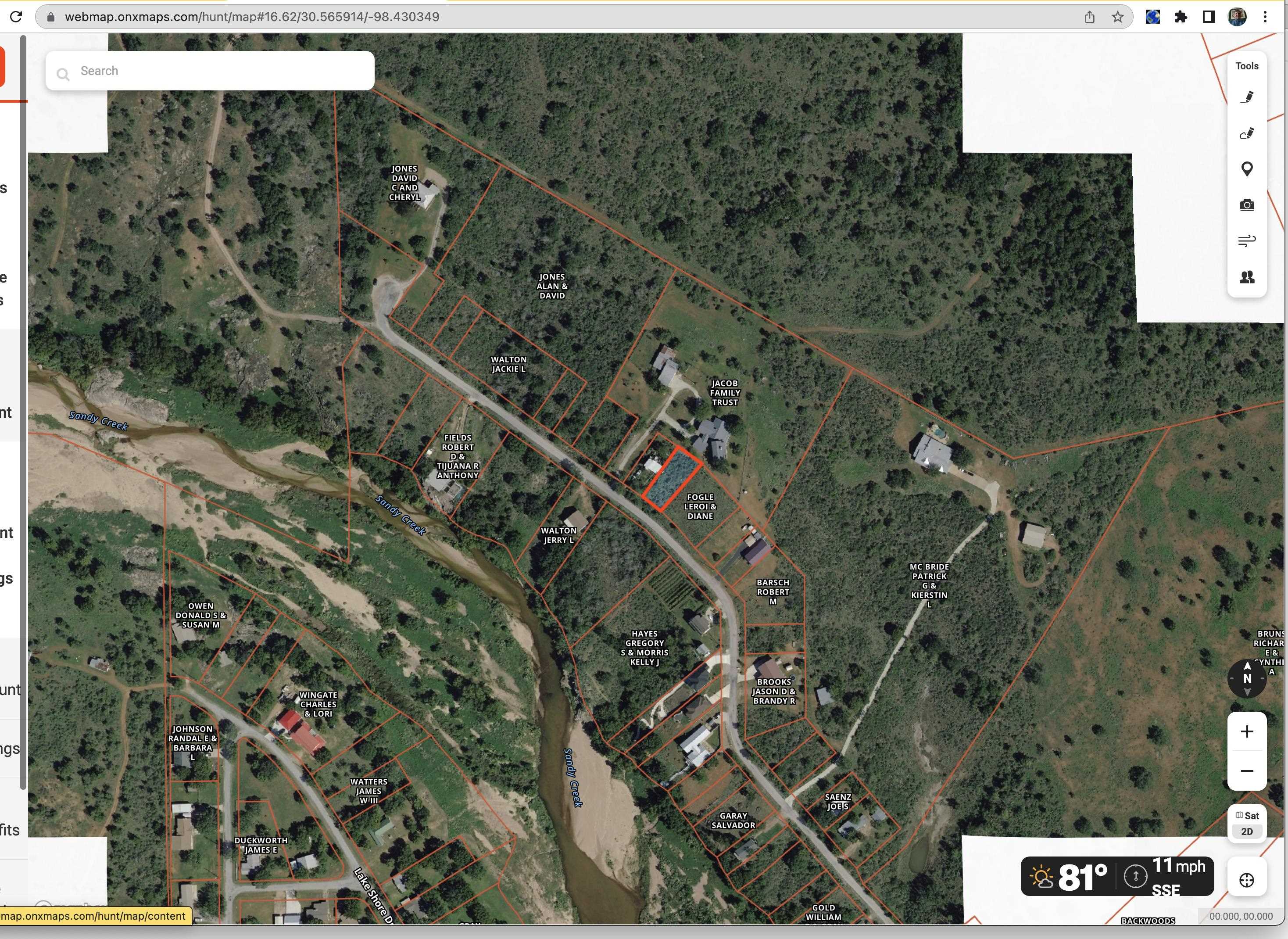 Sandy Mountain Drive Sunrise Beach, TX 78643 - Photo 12 of 14 a view of a city with lush green forest