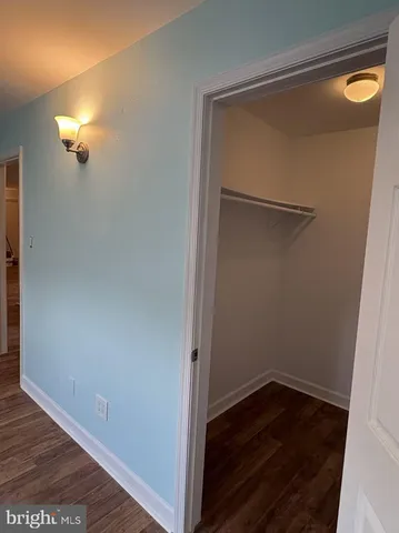 a view of small space with racks on the wall