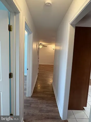 a bathroom with a shower a toilet and a bathtub