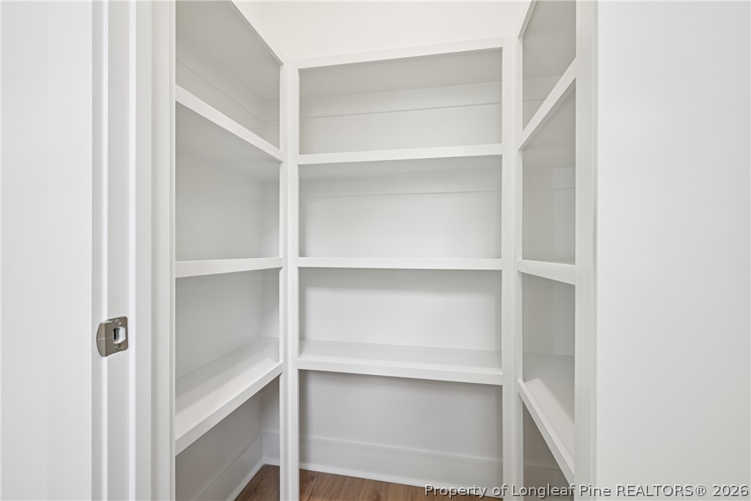 78 Graduate Ct Spring Lake Spring Lake, NC 28390 - Photo 11 of 43 a view of walk in closet with empty racks