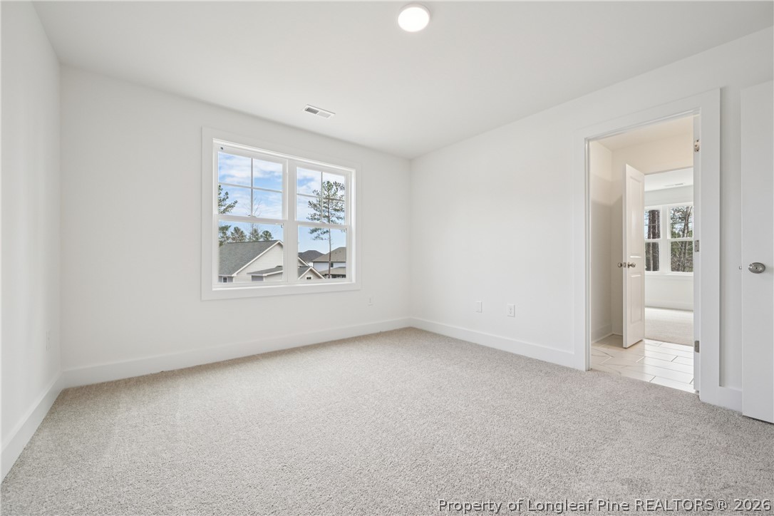 78 Graduate Ct Spring Lake Spring Lake, NC 28390 - Photo 21 of 43 an empty room with windows
