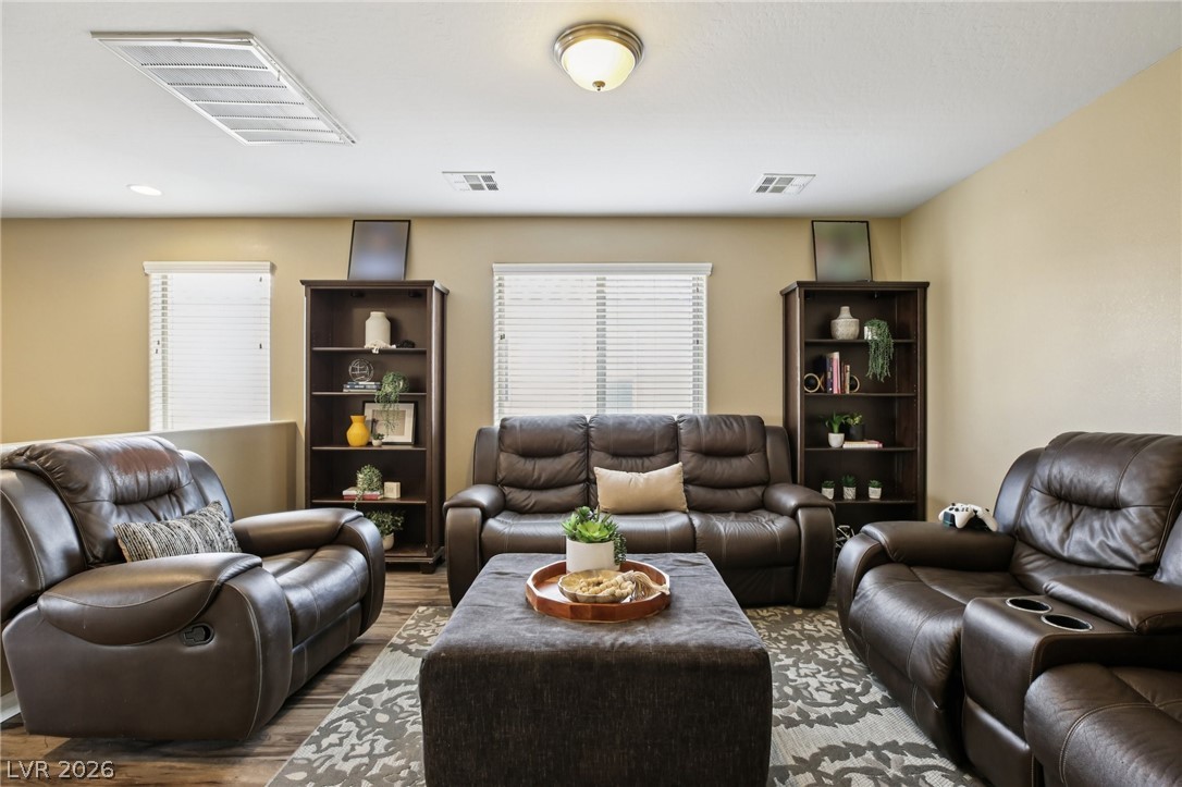 3957 East Carla Ann Road North Las Vegas, NV 89081 - Photo 14 of 35 Living room with wood finished floors