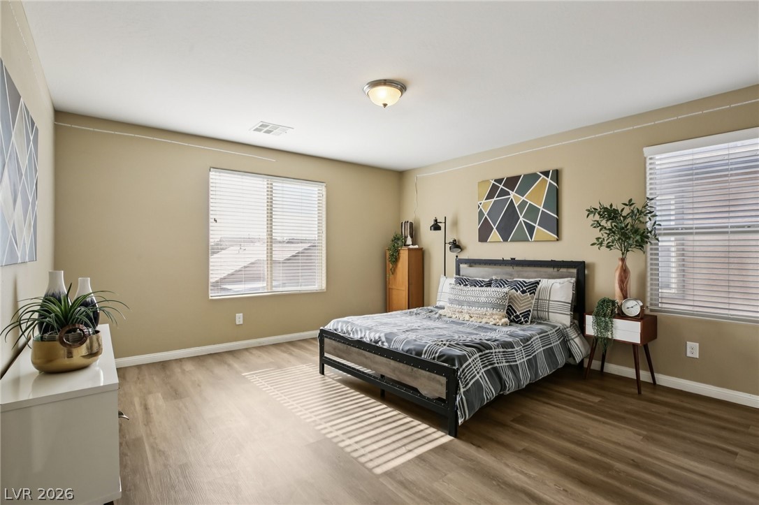 3957 East Carla Ann Road North Las Vegas, NV 89081 - Photo 26 of 35 Bedroom with wood finished floors