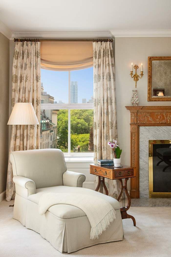 740 Park Avenue, Unit 6/7D Manhattan, NY 10021 - Photo 11 of 19 a living room with furniture and a large window