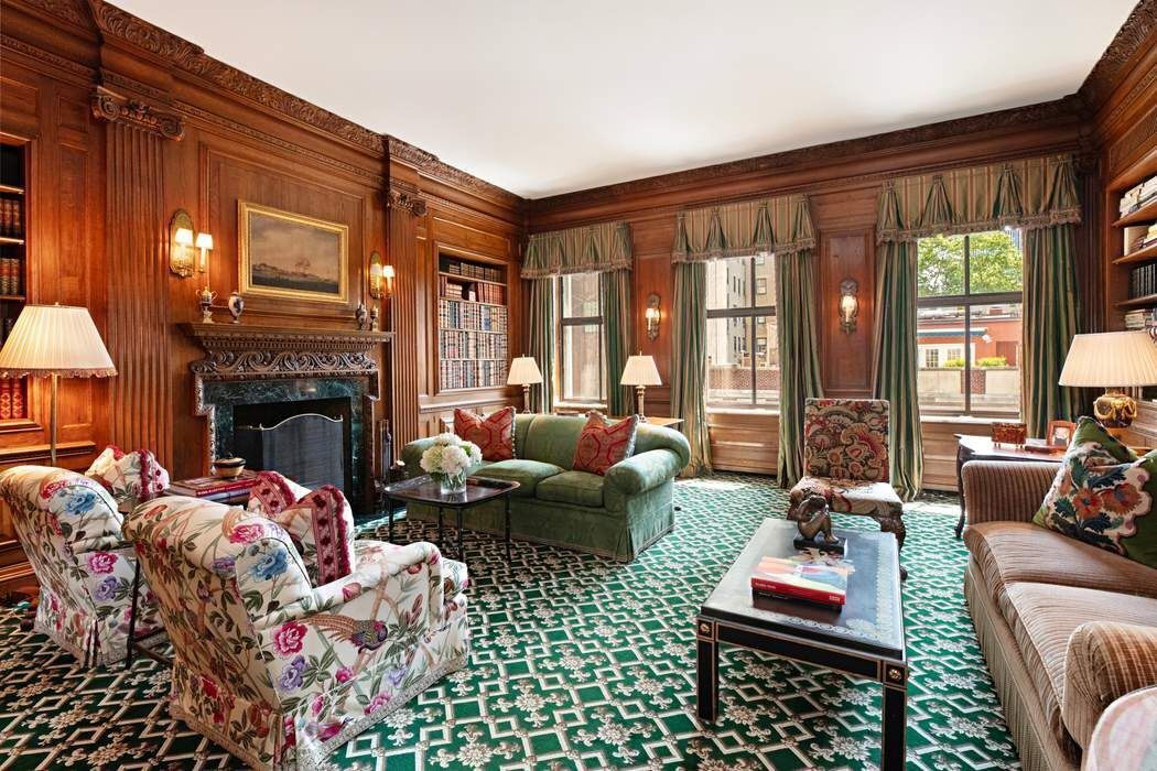 740 Park Avenue, Unit 6/7D Manhattan, NY 10021 - Photo 4 of 19 a living room with furniture fireplace and a large window