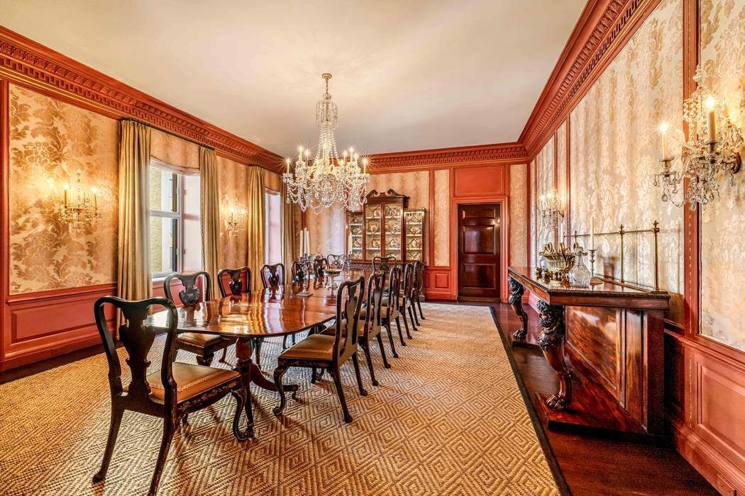 740 Park Avenue, Unit 6/7D Manhattan, NY 10021 - Photo 6 of 19 a view of a dining room with furniture window and wooden floor