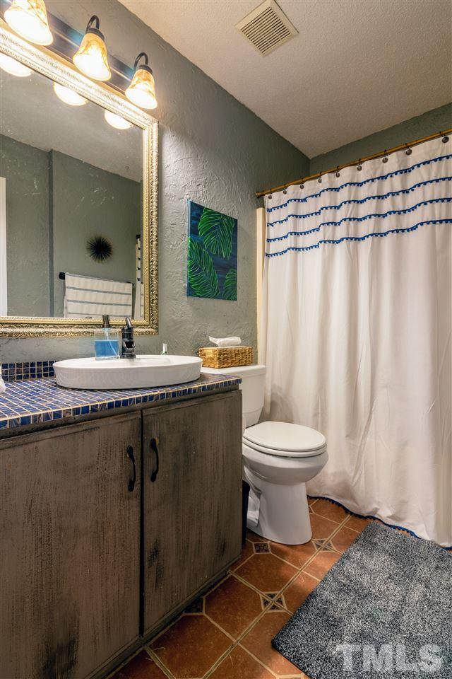 5717 Delbarton Court Raleigh, NC 27606 - Photo 20 of 30 Gallery Image 20
