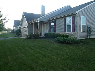 13 Tisdale Road Whiting, NJ 08759 - Photo 1 of 3 a front view of a house with a garden