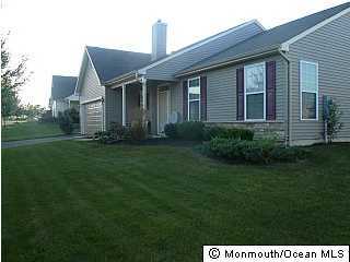 13 Tisdale Road Whiting, NJ 08759 - Photo 3 of 3 a front view of a house with a garden