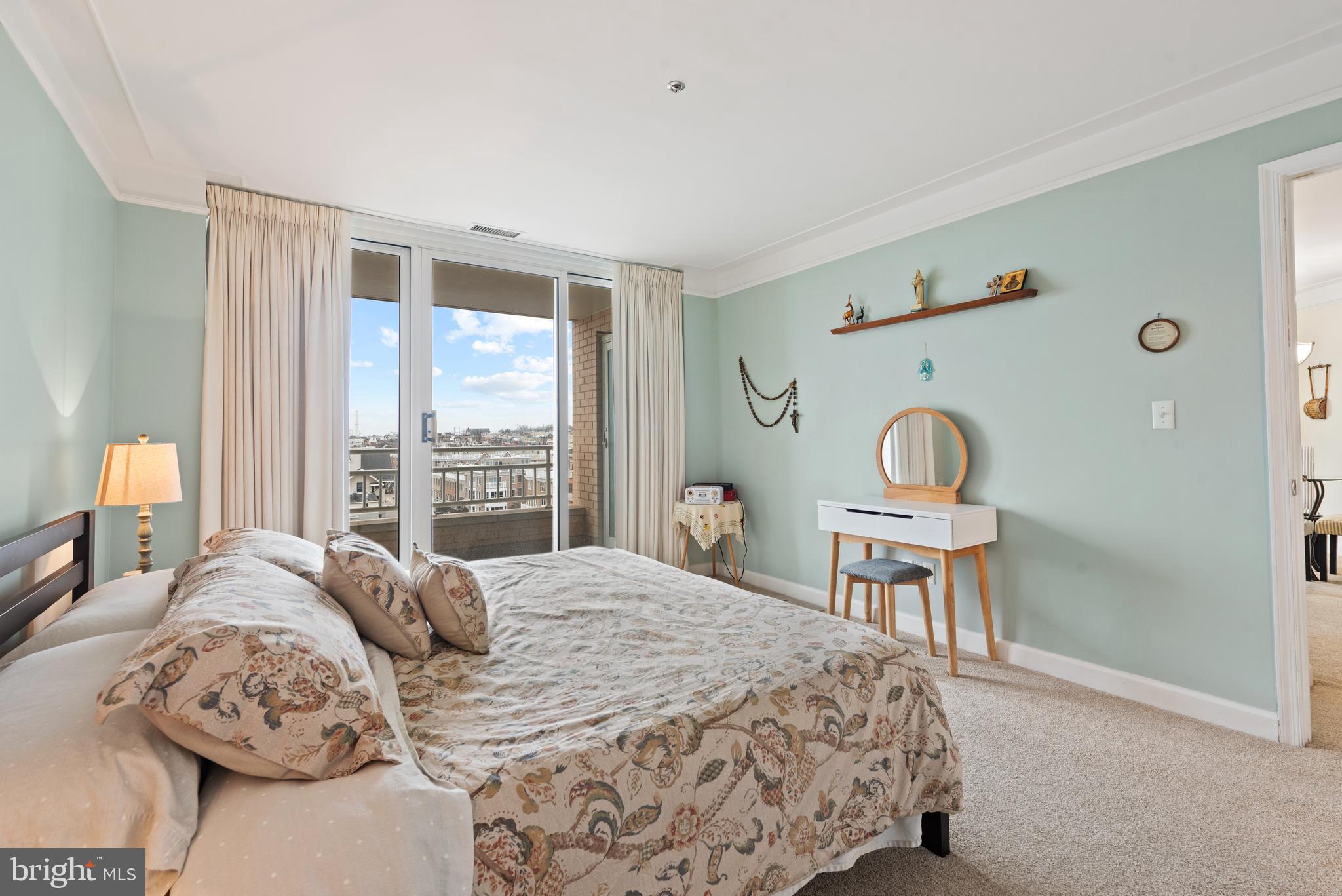 100 Harborview Drive, Unit 612 Baltimore, MD 21230 - Photo 19 of 49 a bedroom with a bed chair and a window