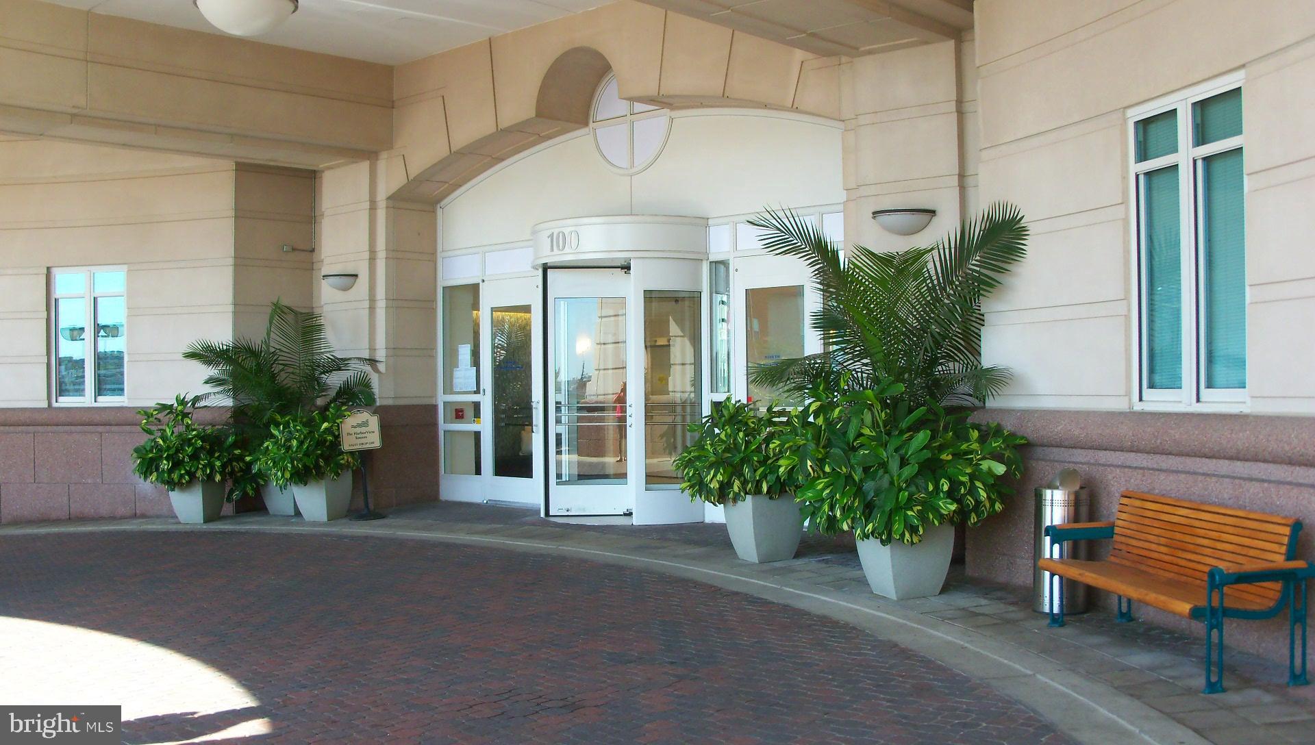 100 Harborview Drive, Unit 612 Baltimore, MD 21230 - Photo 2 of 49 a front view of a house with a garden