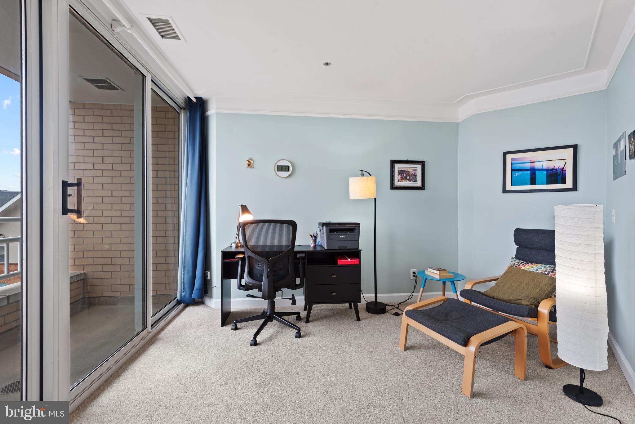 100 Harborview Drive, Unit 612 Baltimore, MD 21230 - Photo 24 of 49 a view of a workspace with furniture and a window