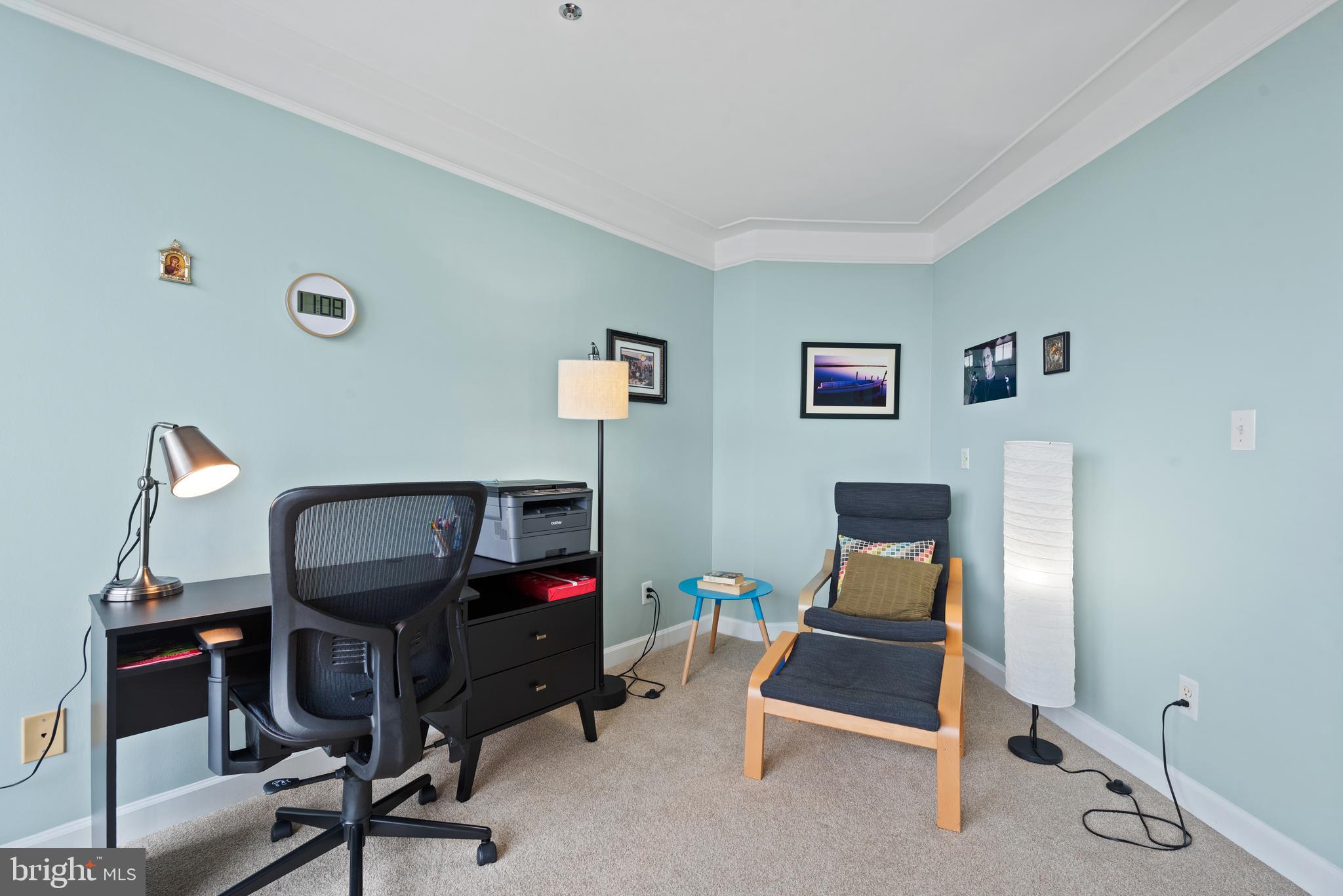 100 Harborview Drive, Unit 612 Baltimore, MD 21230 - Photo 25 of 49 a room with furniture and air hockey table