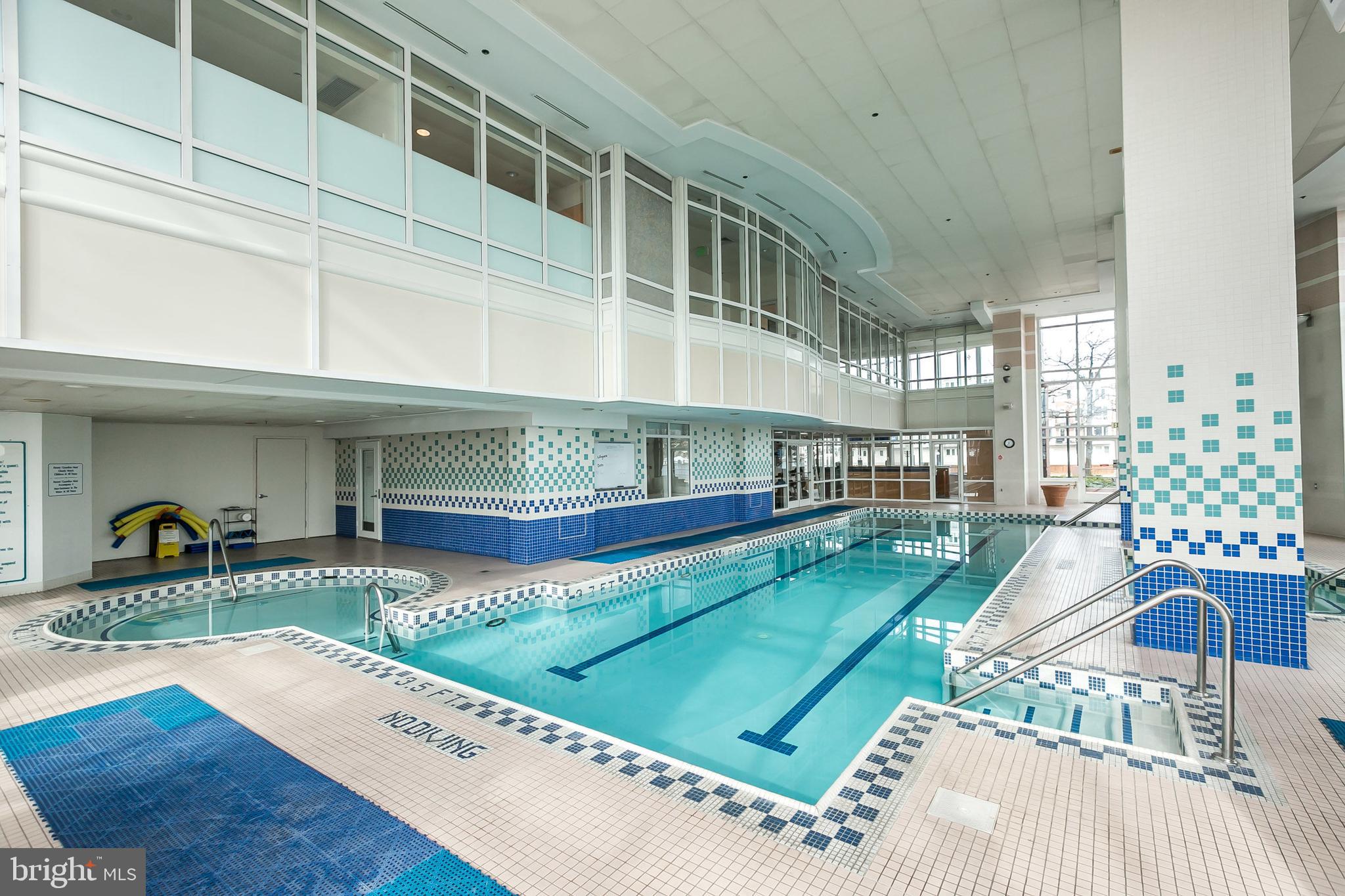 100 Harborview Drive, Unit 612 Baltimore, MD 21230 - Photo 38 of 49 a view of a swimming pool with an outdoor seating