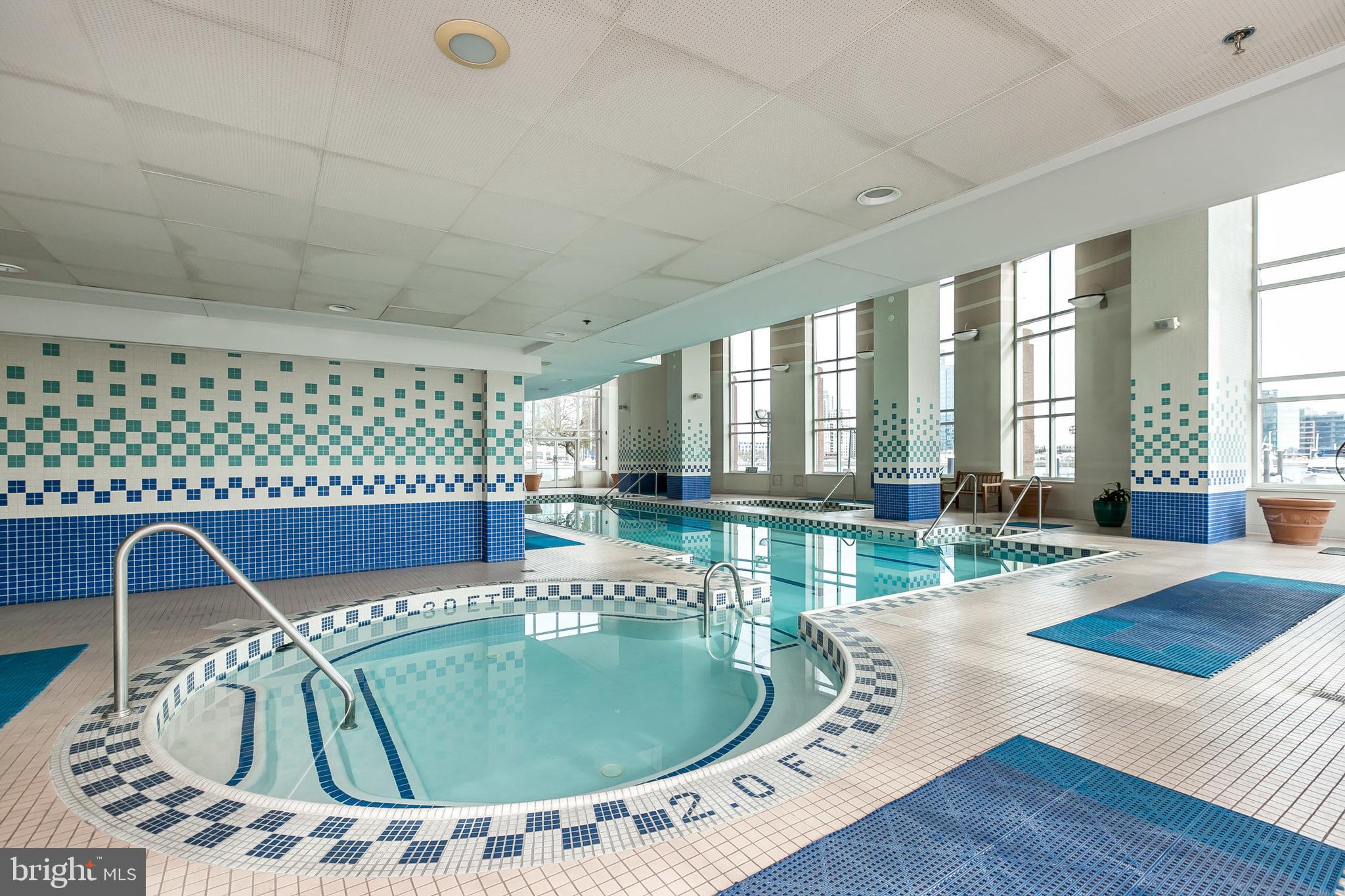 100 Harborview Drive, Unit 612 Baltimore, MD 21230 - Photo 40 of 49 a swimming pool with outdoor seating