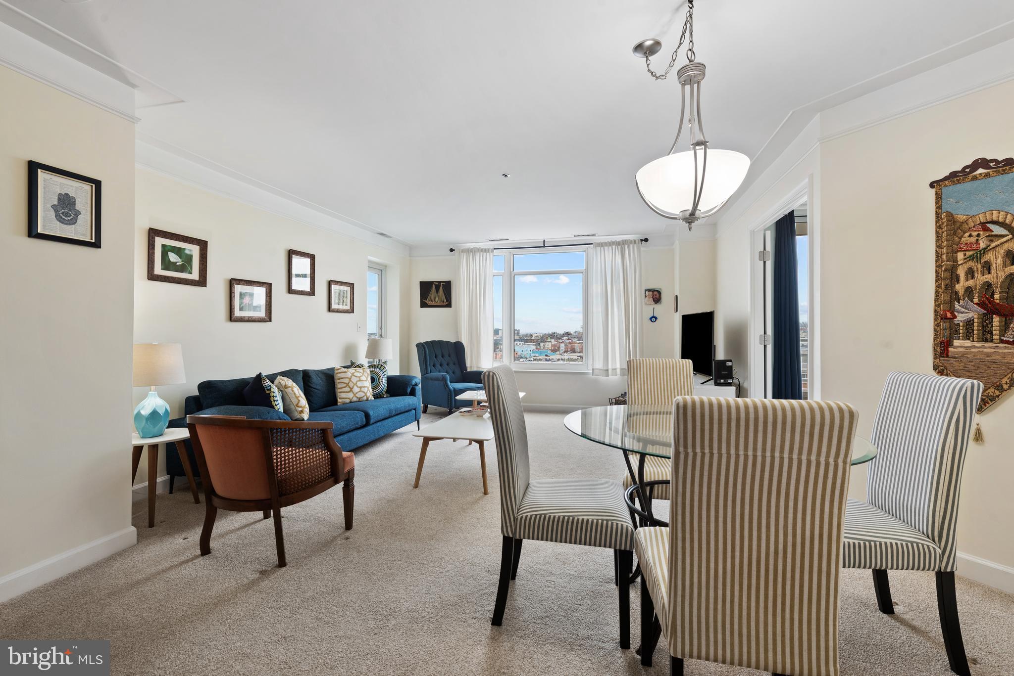 100 Harborview Drive, Unit 612 Baltimore, MD 21230 - Photo 10 of 49 a view of a livingroom with furniture and window