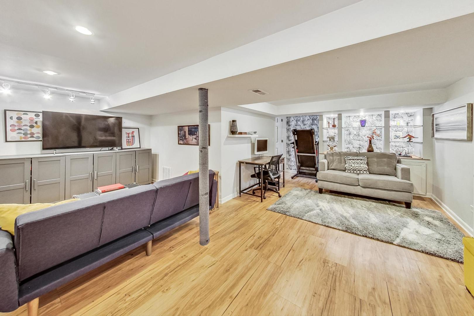 792 Spring Road Elmhurst, IL 60126 - Photo 15 of 26 a living room with furniture and a wooden floor