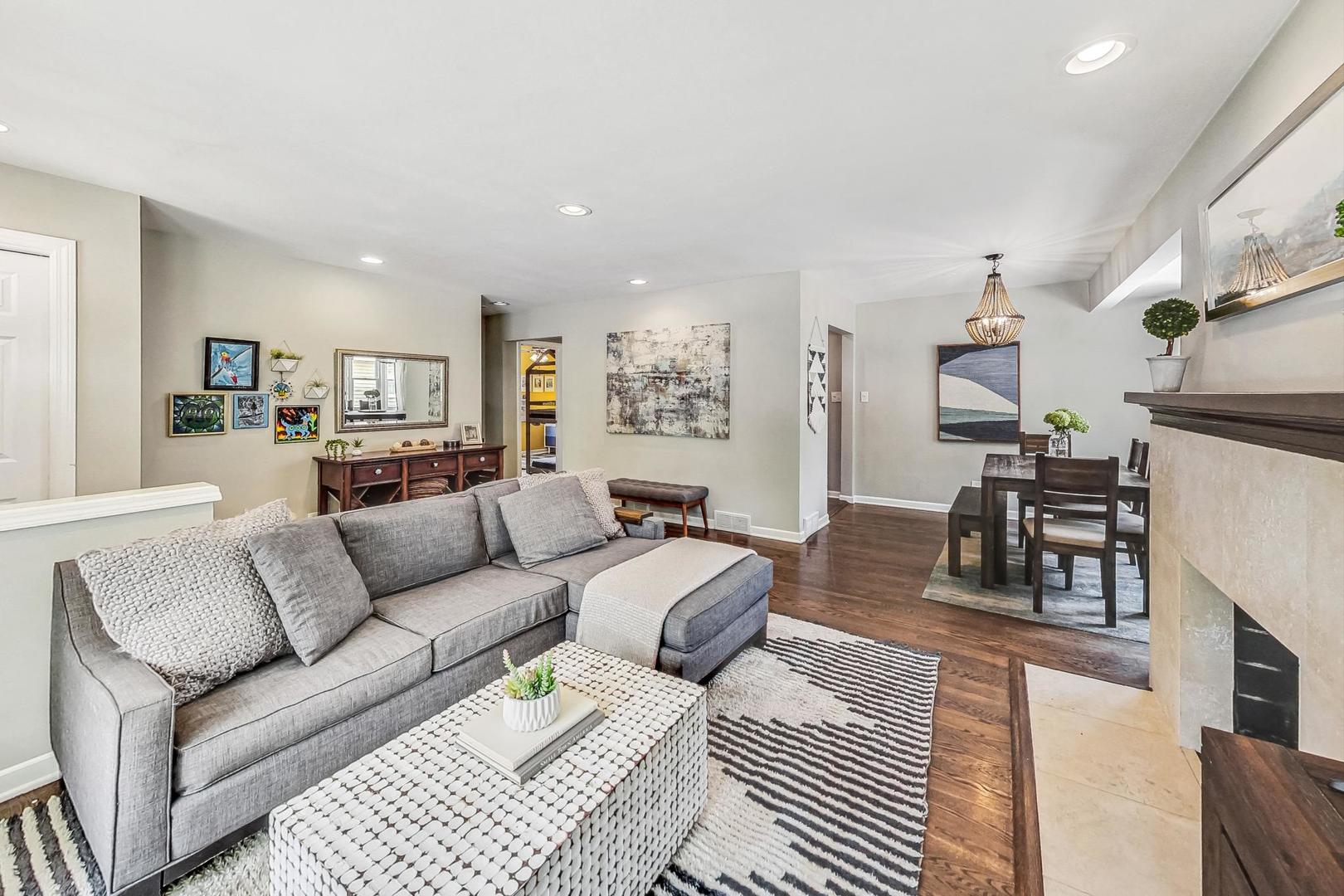 792 Spring Road Elmhurst, IL 60126 - Photo 2 of 26 a living room with furniture and wooden floor