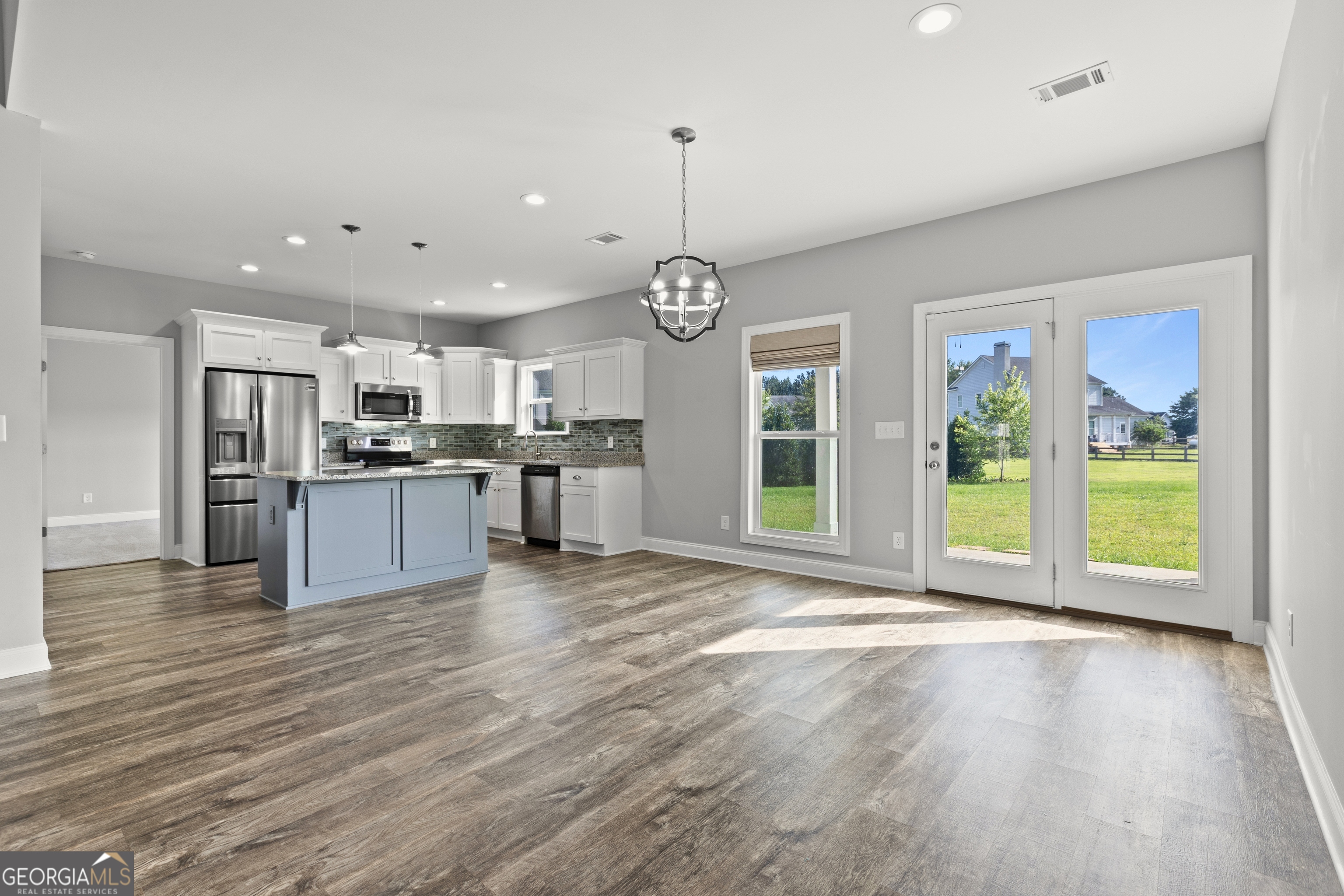 1641 County Road Lanett, AL 36863 - Photo 6 of 32 Dining area with French doors leading to covered patio.