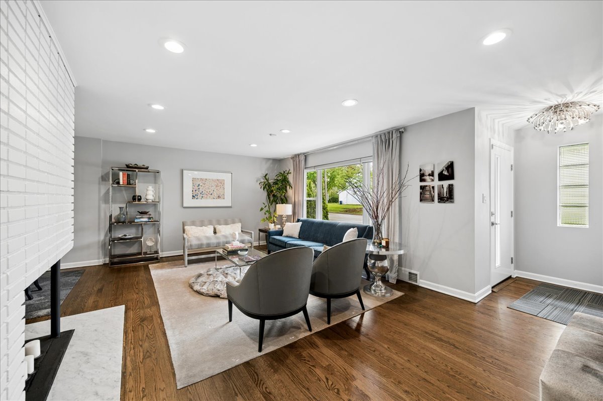 912 Hunter Road Wilmette, IL 60091 - Photo 5 of 38 a living room with furniture and a wooden floor