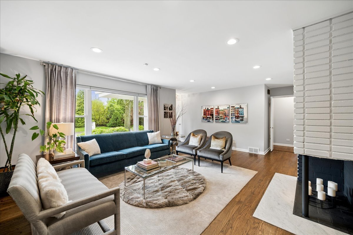 912 Hunter Road Wilmette, IL 60091 - Photo 6 of 38 a living room with furniture and a large window