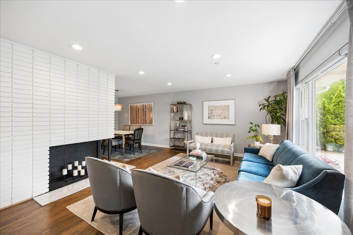 912 Hunter Road Wilmette, IL 60091 - Photo 7 of 38 a living room with furniture and a large window