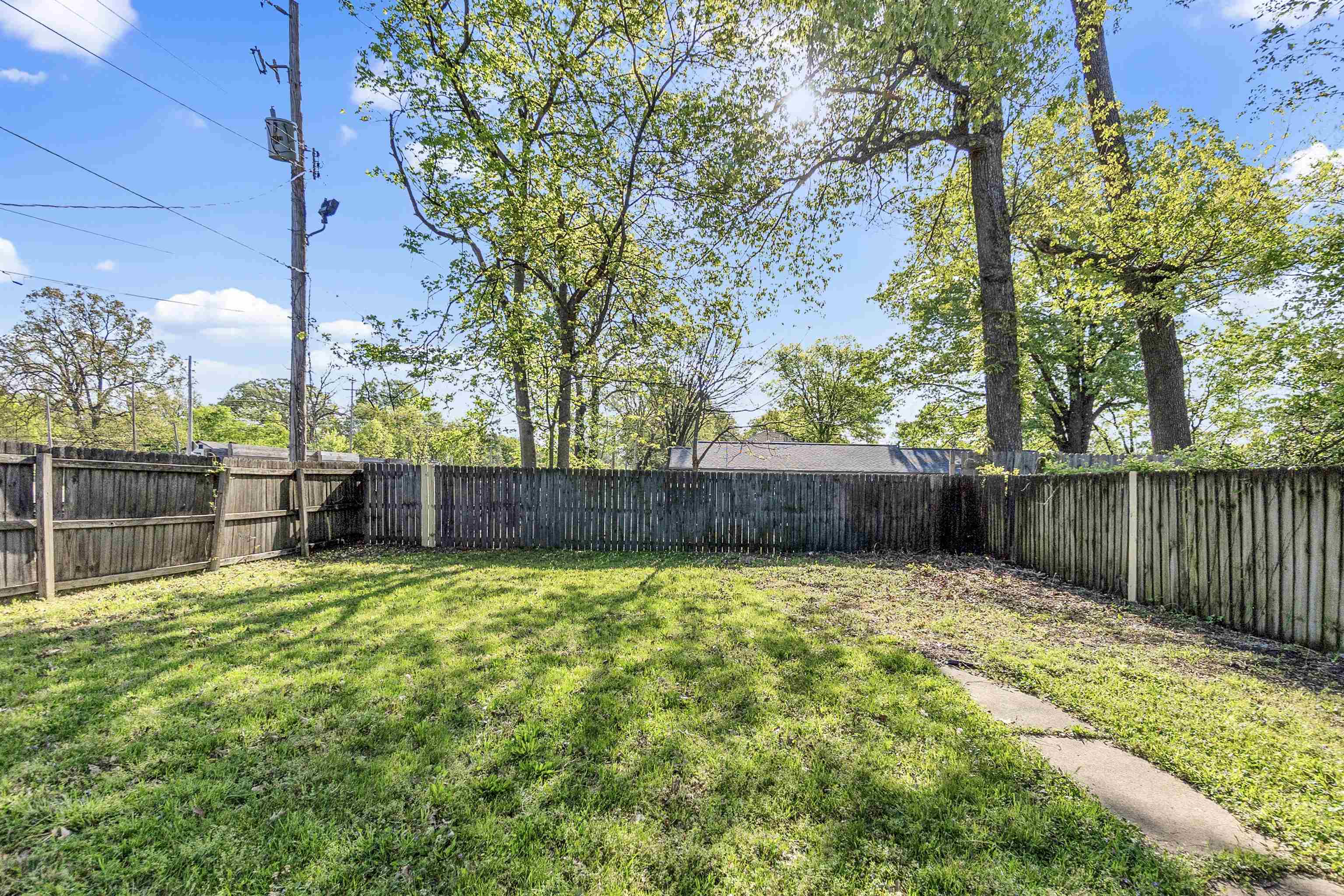 1100 Rozelle Street Memphis, TN 38106 - Photo 19 of 19 a swimming pool with wooden fence