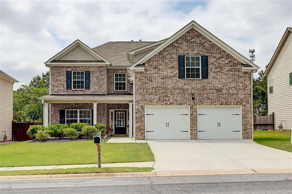 5601 Savannah River Road Atlanta, GA 30349 - Photo 1 of 1 a view of a yard in front view of a house