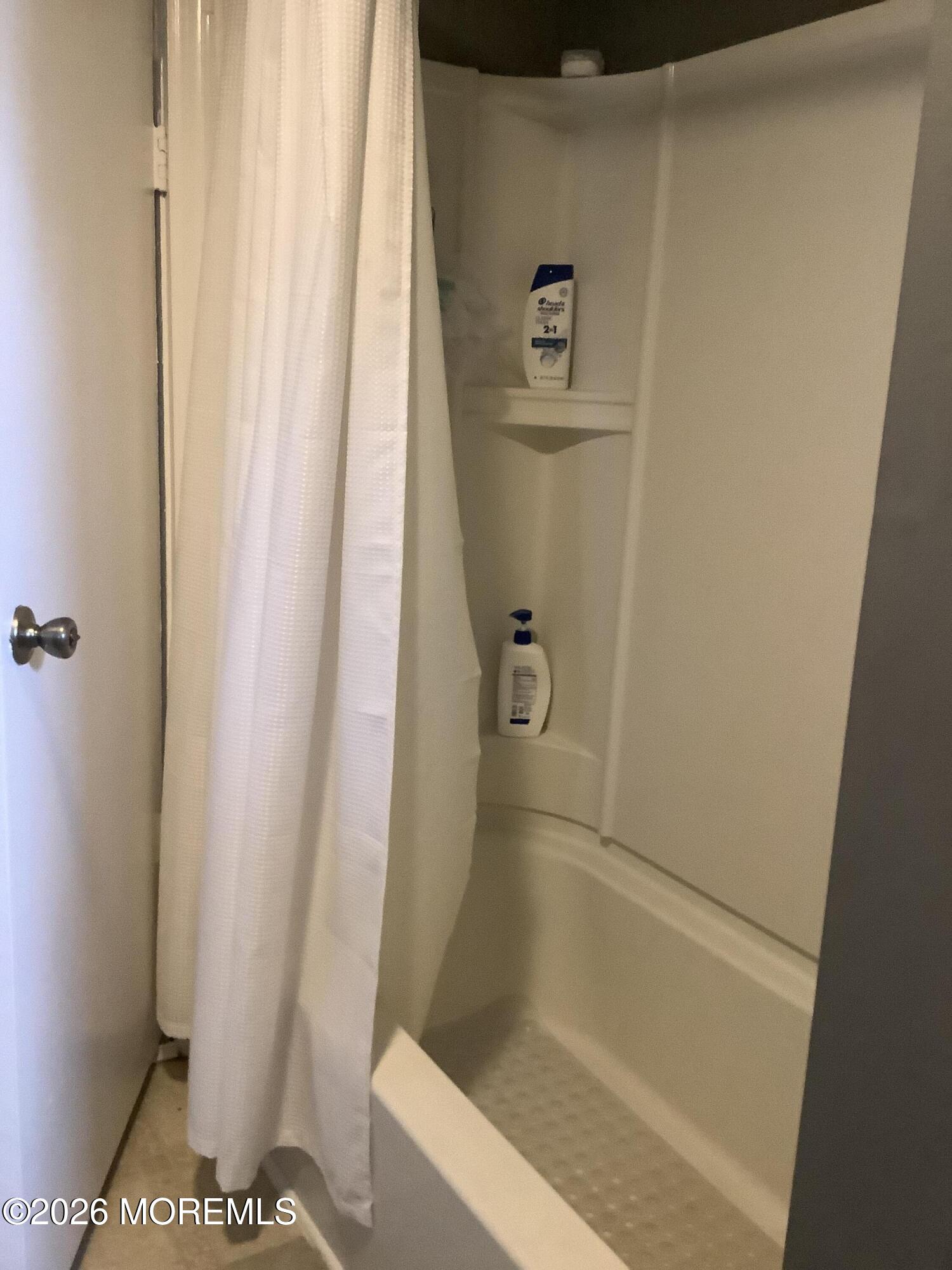 242 1st Street Keyport, NJ 07735 - Photo 22 of 23 a bathroom with a shower and a toilet