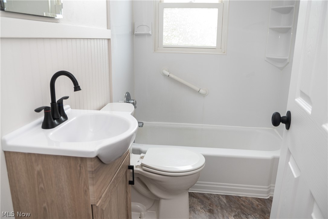 6666 Clingan Road Youngstown, OH 44514 - Photo 31 of 41 Full bathroom on second level with tub surround, new vanity and fixtures
