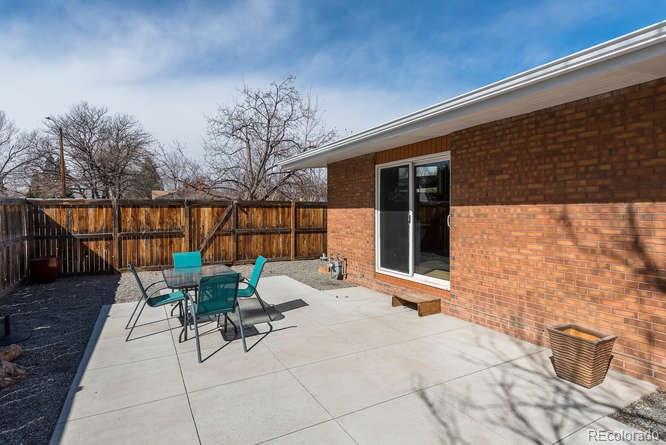 3520 Ward Road Wheat Ridge, CO 80033 - Photo 20 of 22 a building outdoor space with patio furniture and potted plants